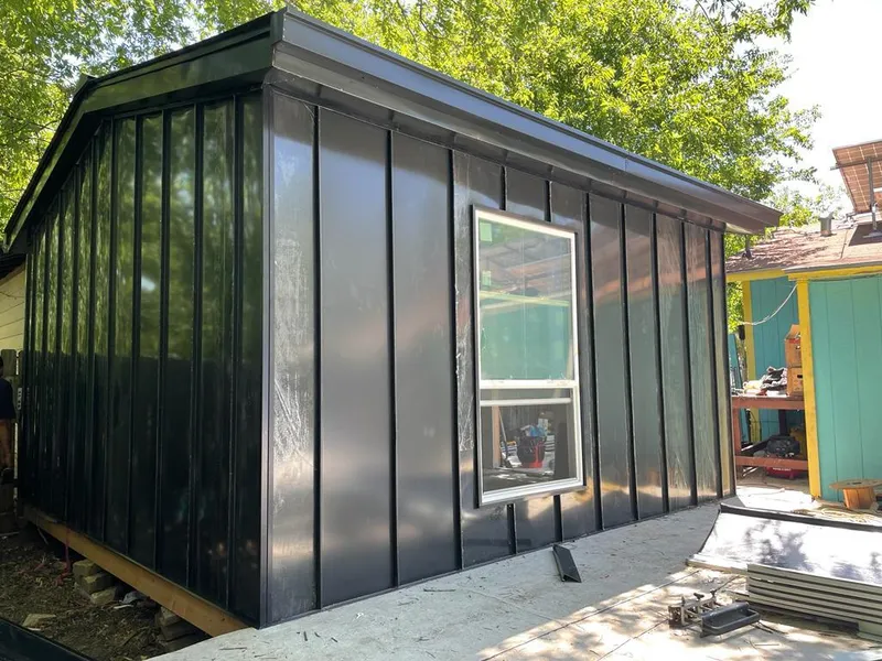 Black standing seam metal wall panels for Metal Roof Installation in Cheviot