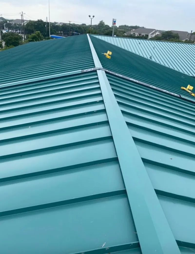 Green commercial metal roof ridge and valley for Metal Roof Repair in Cheviot