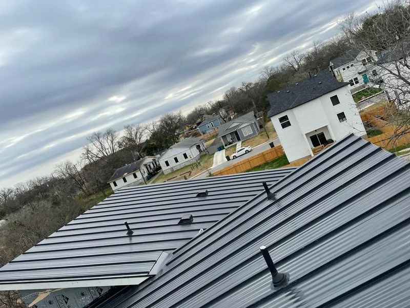 Standing seam metal roof panels with vents for Skylight Repair in Cheviot